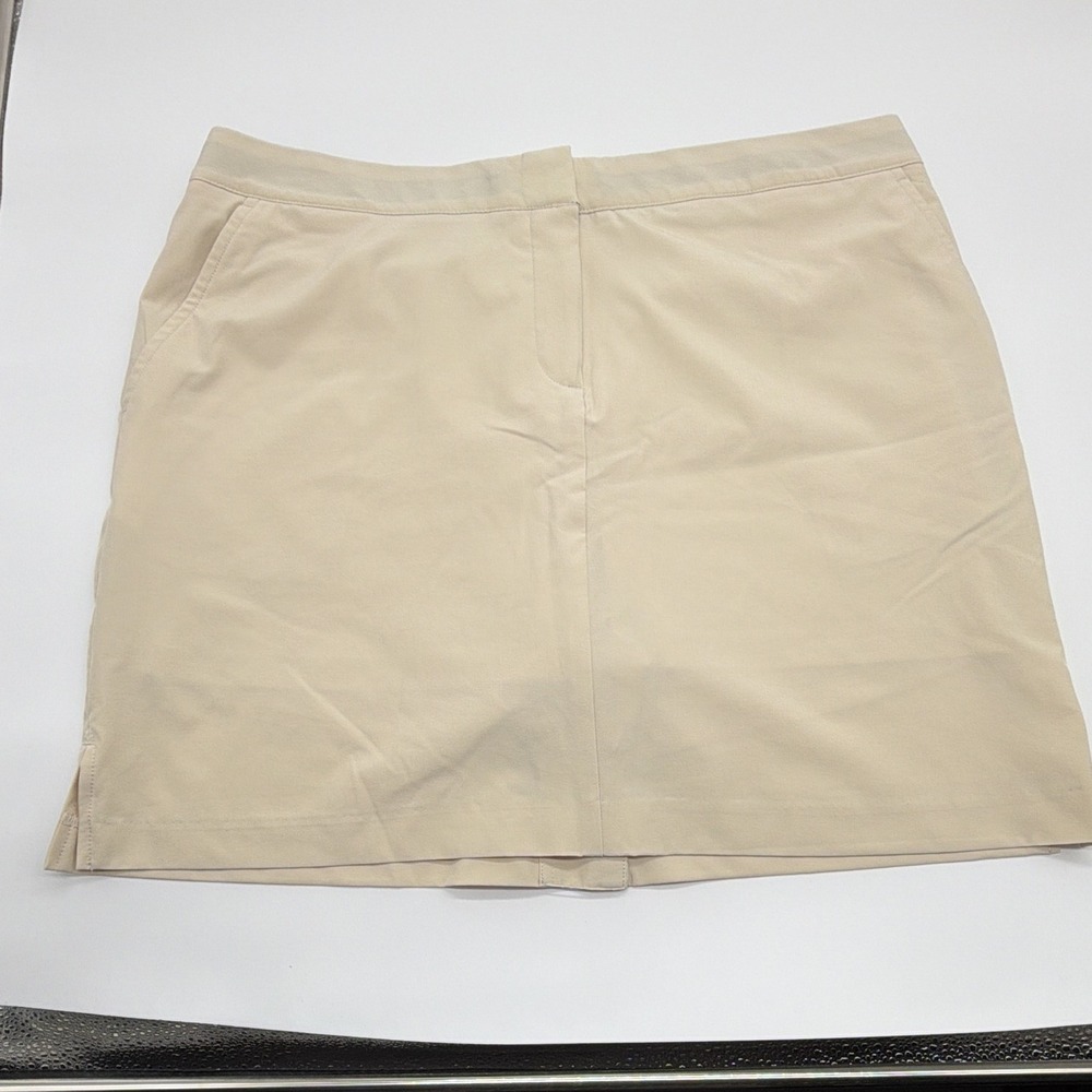 IZOD Golf Women's Beige Solid Skort Size 12 Stretch Lined Pockets Zip NWOT